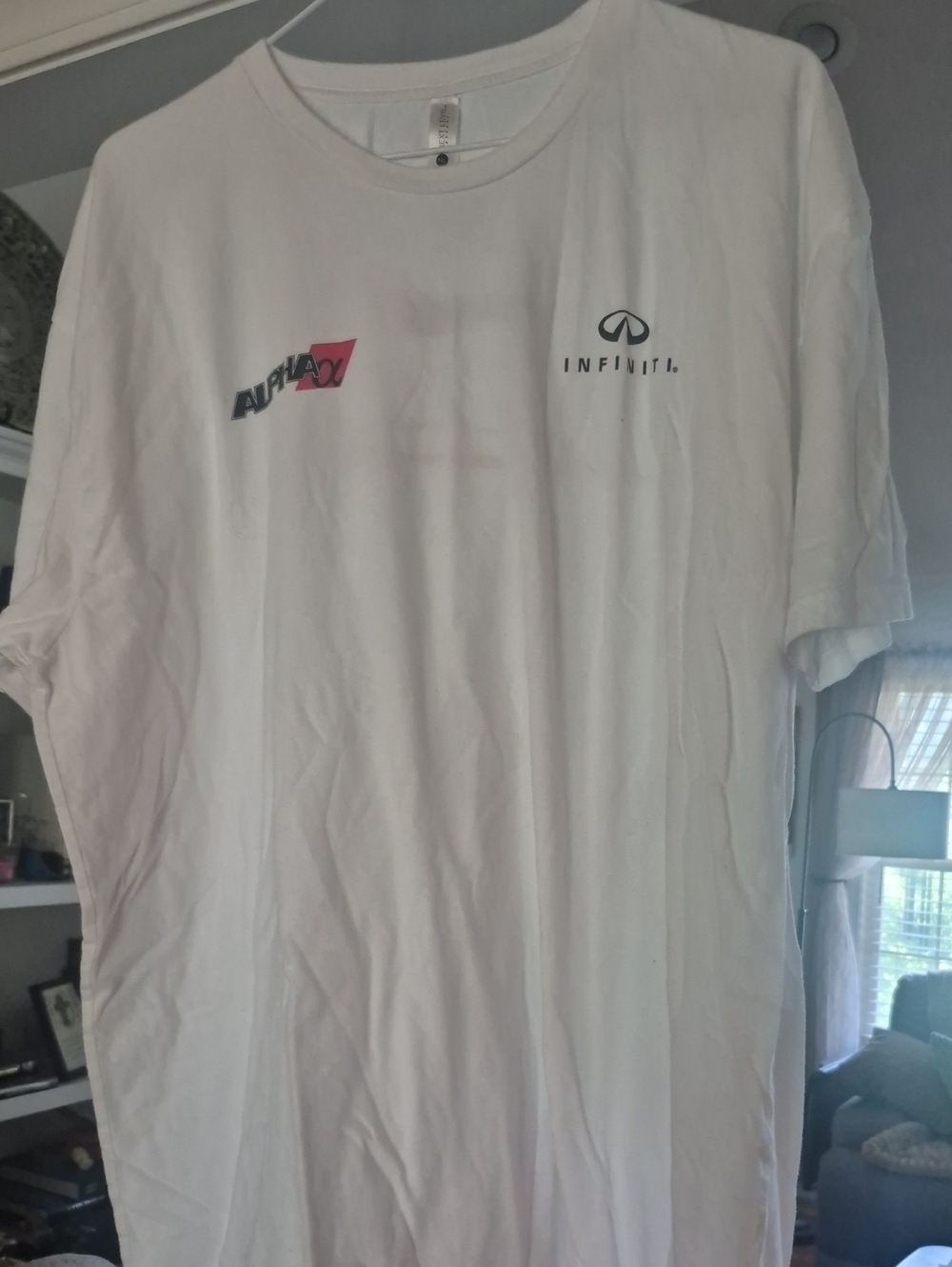 Next Level Apparel White Short Sleeve Tee with Black Logos and Red Accent
